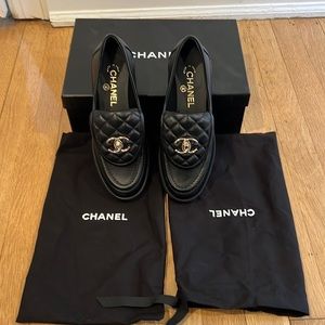 CHANEL Black Loafers Flat NIB Turnlock Quilted Flap Tongue CC Logo Gold Hardware